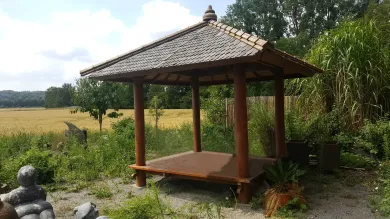 Exhibit - Gazebo garden house with artistic roofing 