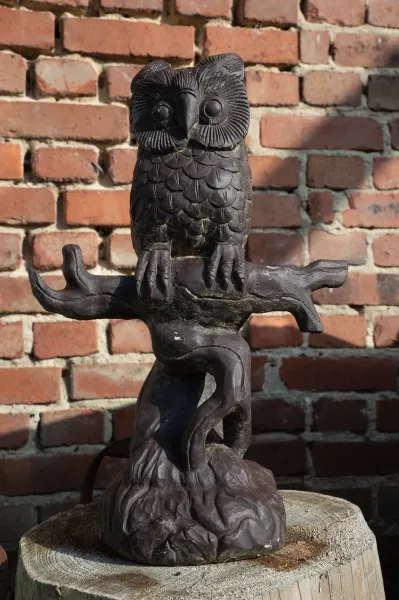 Owl on branch, 47 cm H 