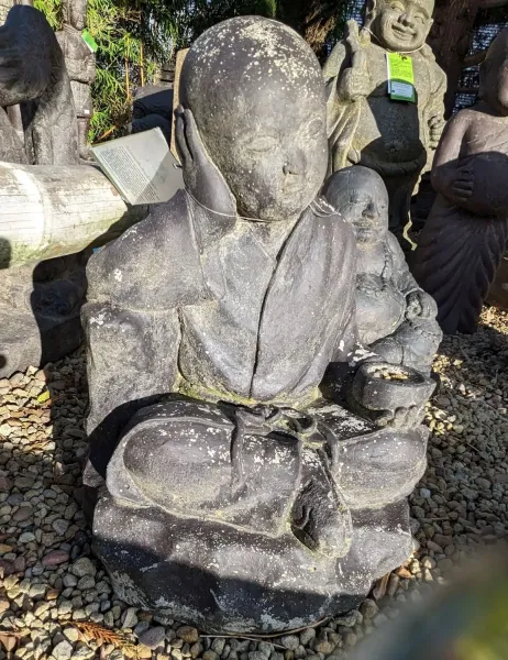 Sitting monk with bowl, 43 cm height, cast stone, handcrafted & coloured 