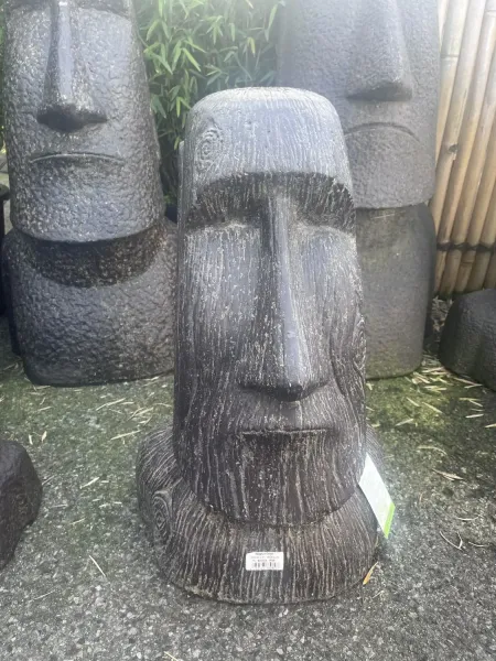 Moai head as planter, structure of surface in wood optic. 40 x 35 x 64cm. Stone cast, handcrafted & coloured 